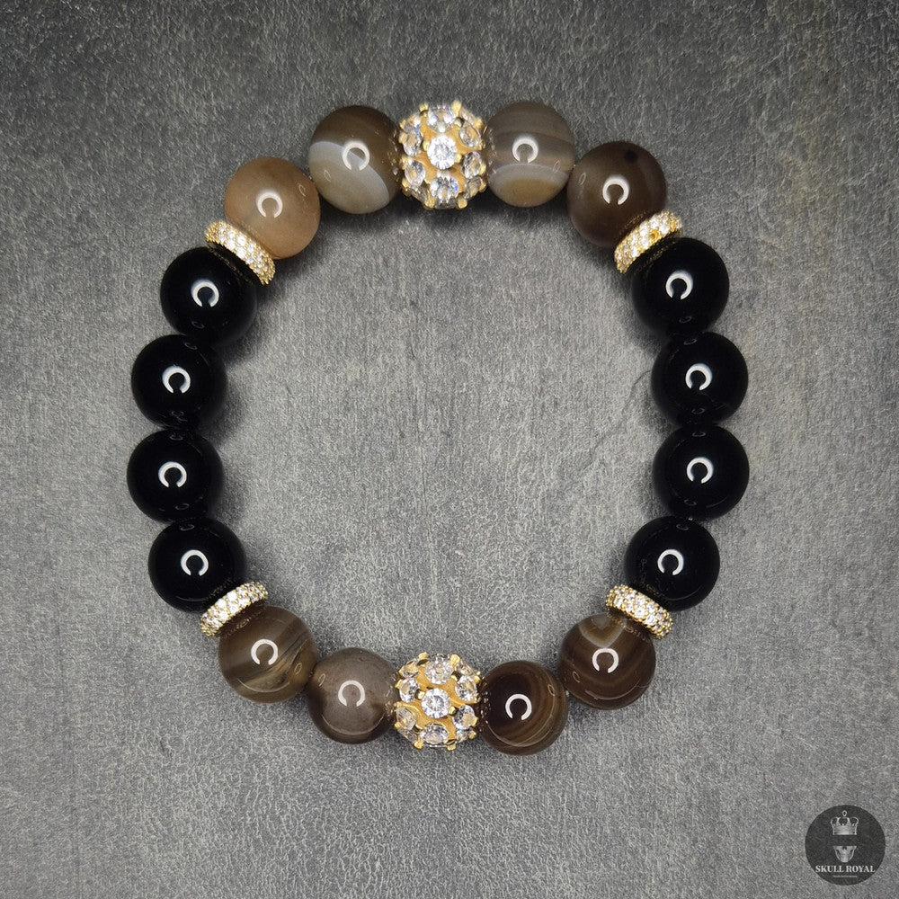 damenarmband glam royal p12 12mm onyx und gebaenderter achat goldene zwischenteile