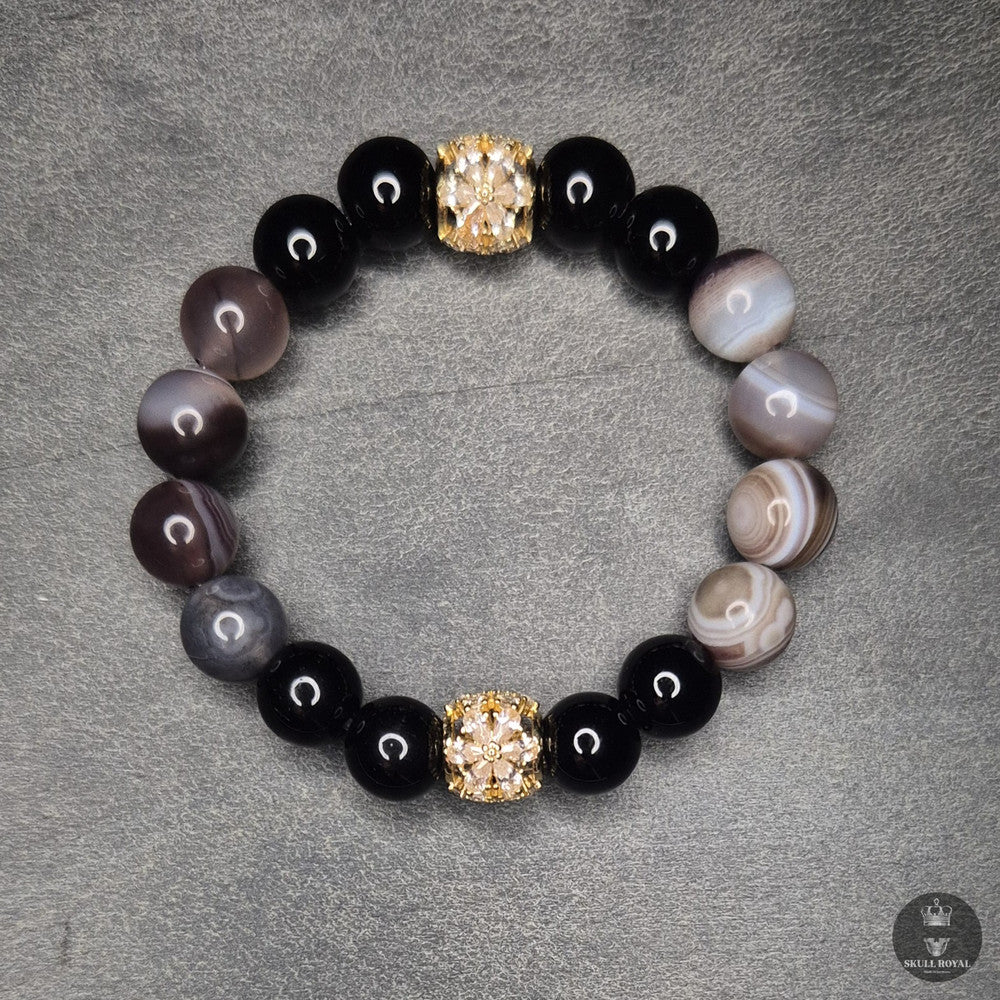 exklusives armband fuer frauen, braun lila botswana achat kombiniert mit schwarzem onyx, zirkonia gelbgold, armband uebergroesse bis 4xl